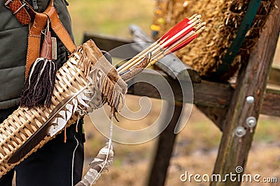 Archer with vintage quiver and wooden arrows - Archery sport Stock Photo