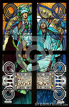 Close-up of the Art Nouveau stained glass window by Alfons Mucha, St. Vitus Cathedral, Praue Editorial Stock Photo