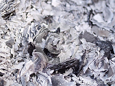 Close up ashes and cinders from ghost money paper burning for Ancestor in Chinese New Year Stock Photo