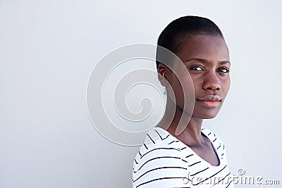 Close up attractive young black woman with serious expression Stock Photo