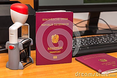 Close-up of Austrian biometric passport with a date stamper, interstate border in Europe. Inscription - European Union, Republic Stock Photo