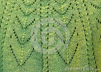 Close-up background image of a variegated knitted blanket with a colorful graphic design Stock Photo