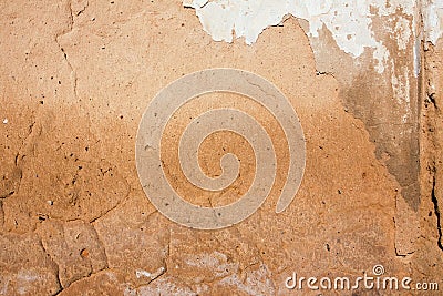 Close-up background of plaster covered shabby old worn wall, horizontal rough abstract surface texture Stock Photo