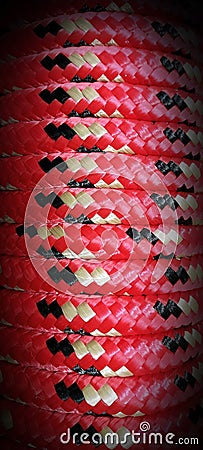 Close-up background of red and black diamond braided rope with space for copy Stock Photo
