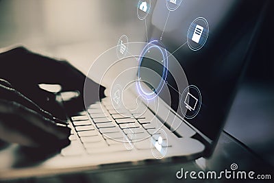 Close up of backlit female hands using laptop on desk with creative round digital interface with various icons. Digital Stock Photo