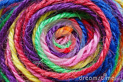 Close-up of a ball of colored threads as an abstract background for unity and cohesion. Stock Photo