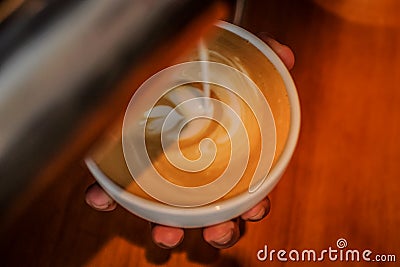 Making a latte Art Stock Photo