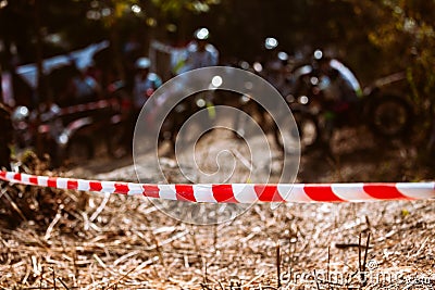 Close-up of barricade plastic rope with mountain bikes racing Stock Photo