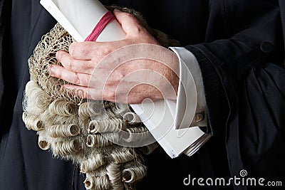 Close Up Of Barrister Holding Wig And Brief Stock Photo