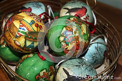 Close up of a basket of paper mache Christmas ornamnets Stock Photo