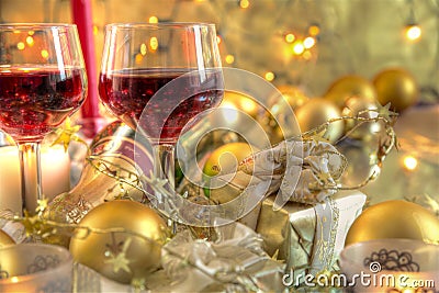 Close-up of bauble,candle and red wine. Stock Photo