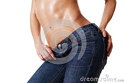 Close-up of beautiful female body in jeans Stock Photo