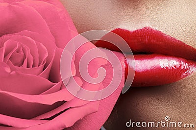 Lips with bright lipgloss makeup. Perfect clean skin, fresh lip make-up. Beautiful spa with tender pink rose flower Stock Photo