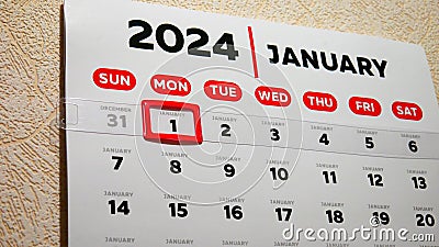 Close-up of a beautiful January page of the wall calendar 2024 with a red cursor on the New year's date Stock Photo