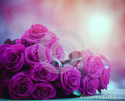 close up beautiful pink roses bouguet with glowing light background Stock Photo