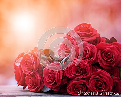 close up beautiful red roses bouguet with glowing light background for valentine day and love theme Stock Photo