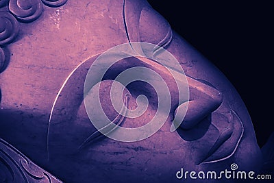 Close up beautiful sleeping Buddha face. Stock Photo