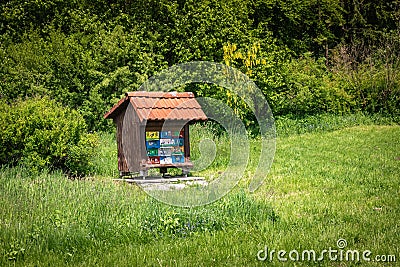 Close up of beautiful wooden bee house apiary in forest, isolated, collecting forest flower honey, cerknica, slovenia Stock Photo