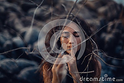 Close up of beautiful young woman outdoors. witch craft concept Stock Photo