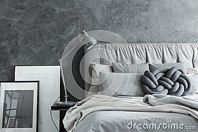 Close-up, bedroom with gray headboard Stock Photo