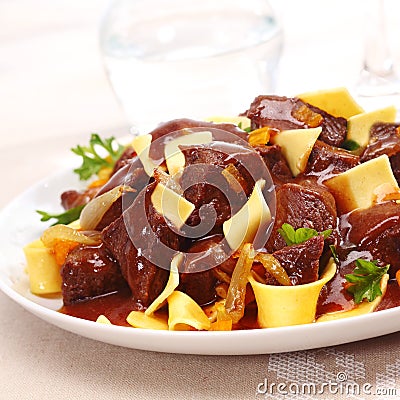 Close up of beef goulash and noodles Stock Photo