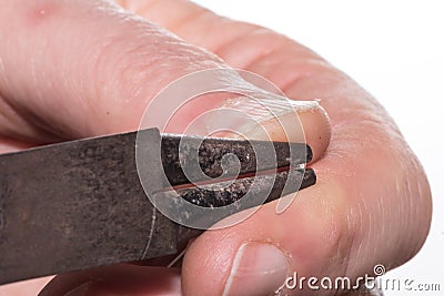 Close up - Bend wire with a nose pliers Stock Photo