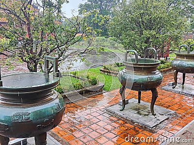 Close-up of a big decorated metal pot at Mausoleum of Emperor Tu Duc, Hue, Vietnam Stock Photo