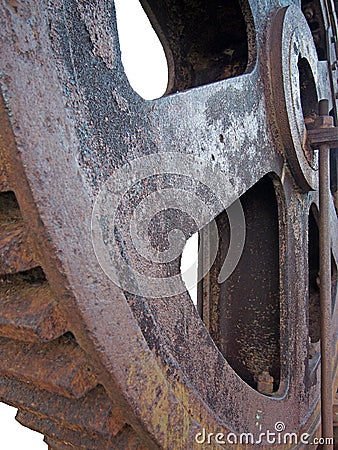 Close up of a big steel rusted cog wheel with large gear teeth Stock Photo