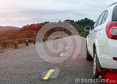 Close up of Big White Family Car from Rear View Parking on Rural Asphalt Road in Country side of Thailand for Start Journey Stock Photo