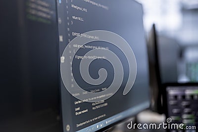 Close up of binary script running on PC monitors Stock Photo