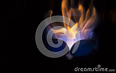 Close up of Bioethanol fueled portable fireplace burning at home. Stock Photo