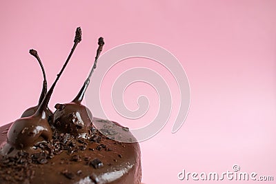 Close up birthday cake with chocolate icing and decorated with c Stock Photo