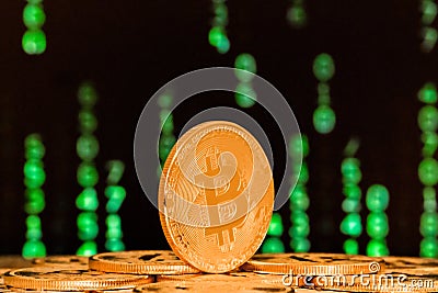 Close up of bitcoin with numbers in backgrounds Stock Photo