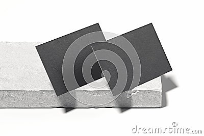 Close up of black blank business cards set on concrete showcase. 3d rendering. Empty space. Copy space. Stock Photo