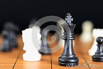 Chess pieces on wood chessboard Stock Photo