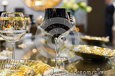 Close up of black and with a golden rim luxurious glasses near p Stock Photo