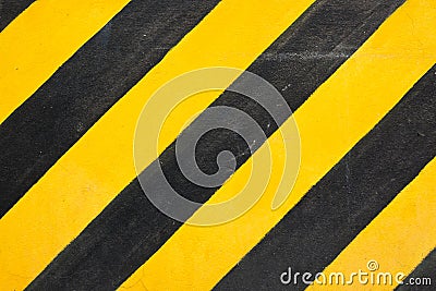 Close-up of black and yellow crosswalk texture, background Stock Photo