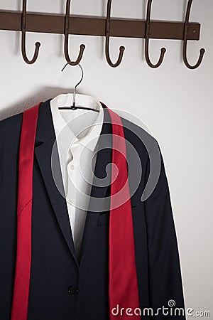 Close-up of blazer hanging on hook Stock Photo