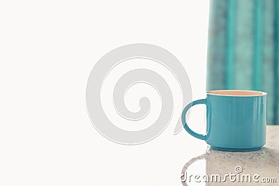 Cup on white table Stock Photo