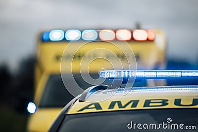 Close-up of blue light flasher on roof of ambulance car Stock Photo