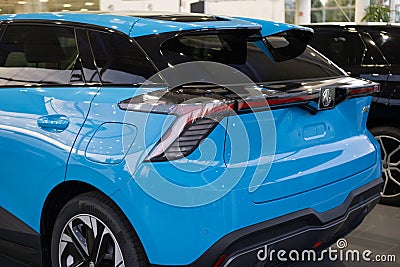 close-up blue MG Car model 4, electric Chinese company brand Nanjing Automobile in showroom, alternative energy, concept Editorial Stock Photo