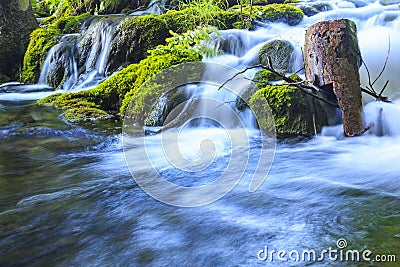 Close up of blue waterfalls in a green forest during daytime in Summer.Plitvice lakes, Croatia Stock Photo