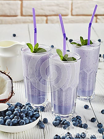 Close-up of blueberry frothy milkshake, top view Stock Photo