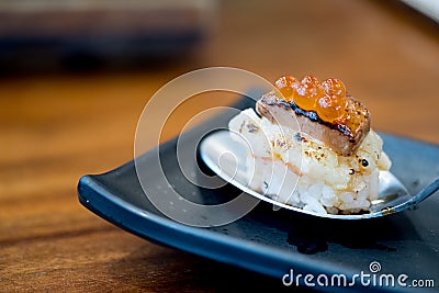 Close up Botan Shrimp and Foie Gras Truffles sushi Stock Photo