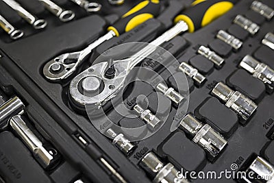 Close-up of box with tools . Set of the professional tools. Closeup of chrome wrench tools organized in box. .Soft focus Stock Photo