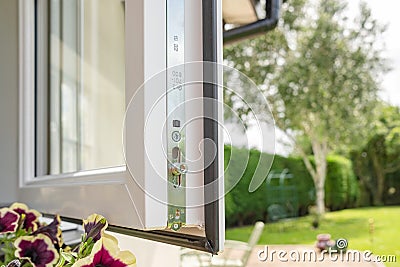 Close-up of a brand new installed double glazed window showing the multiple security locks. Stock Photo