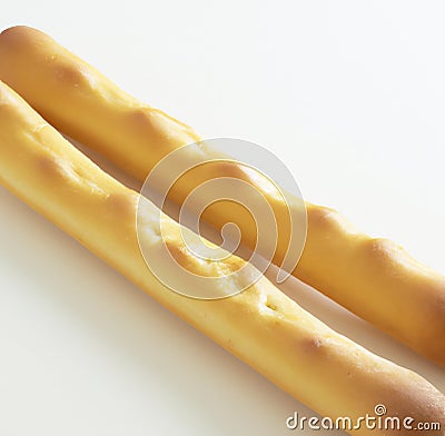 Close up of breadsticks on white background created using generative ai technology Stock Photo