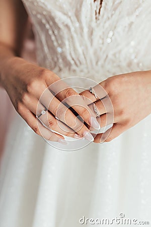 Close-up of the bride`s hands. Stock Photo