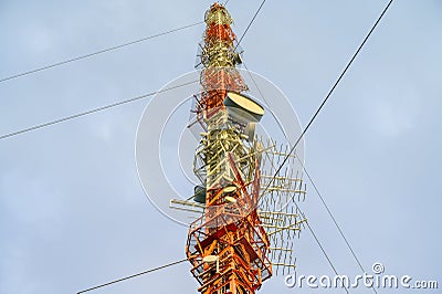Close up of Broadcast and 5G mobile cell tower top with many different antennas Stock Photo