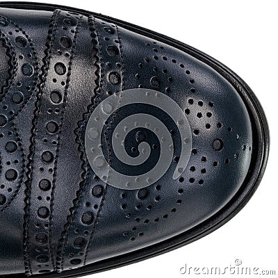 Close-Up of Brogue Detail on Navy Blue Leather Oxford Shoe Stock Photo